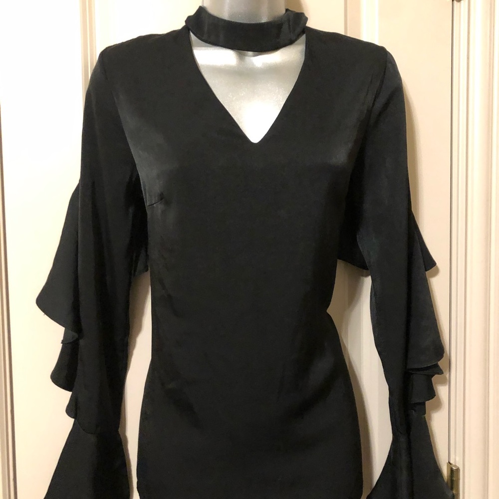 Black long sleeve w/ ruffles v cut
